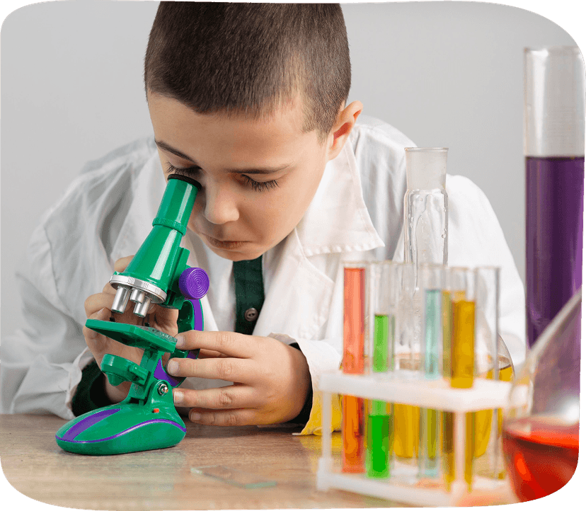 Kid with microscope
